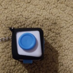 Blue fidget cube with case